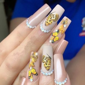 yellow butterfly nails