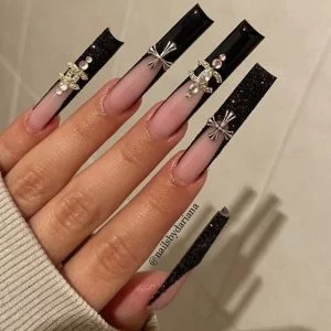 chanel nail art with charms