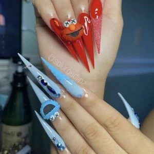 KAWS NAILS XX 🥶🔹💙 so many nail charms came in 🤩 make sure you ask for a  freestyle set 🙈!!! #ncnails #ncnailtech #durhamnailtech…