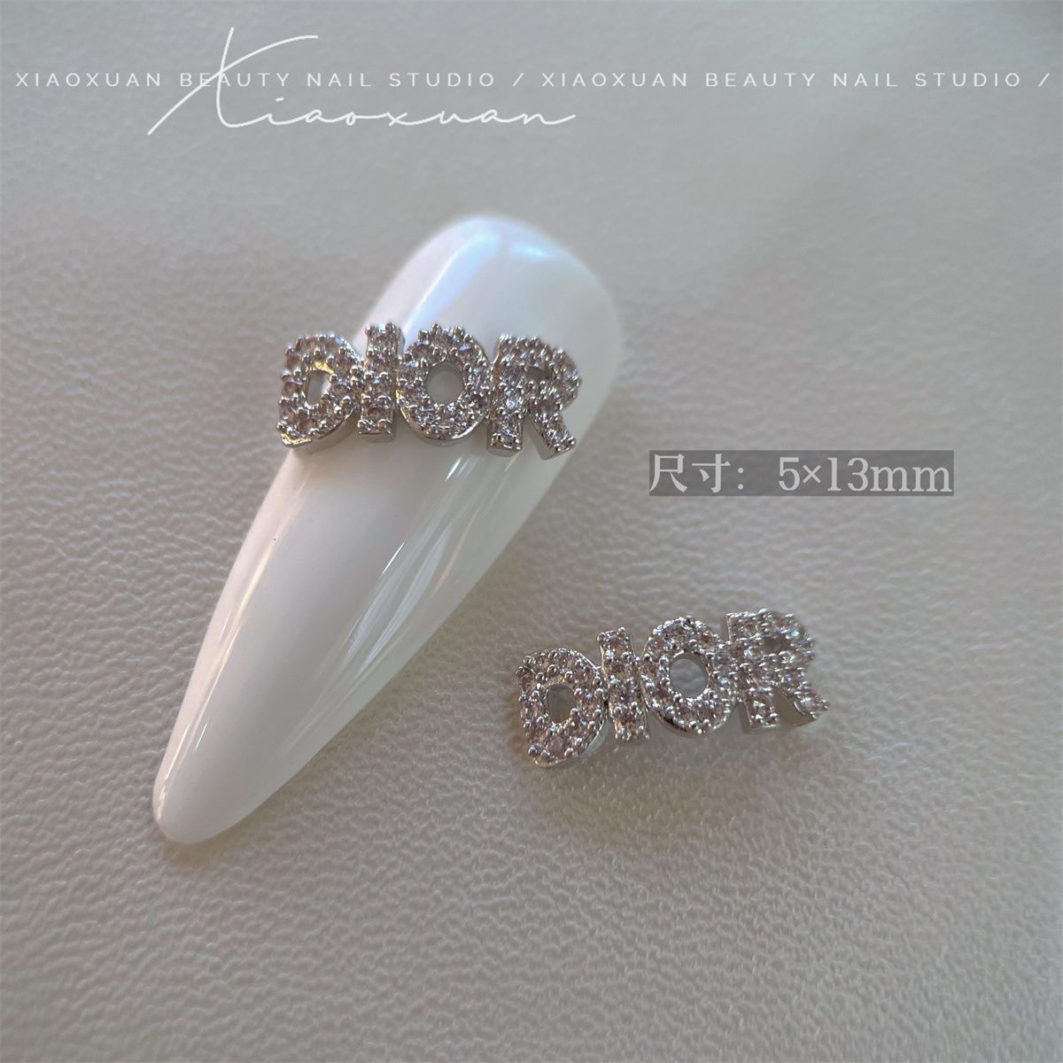 Dior nail charm silver