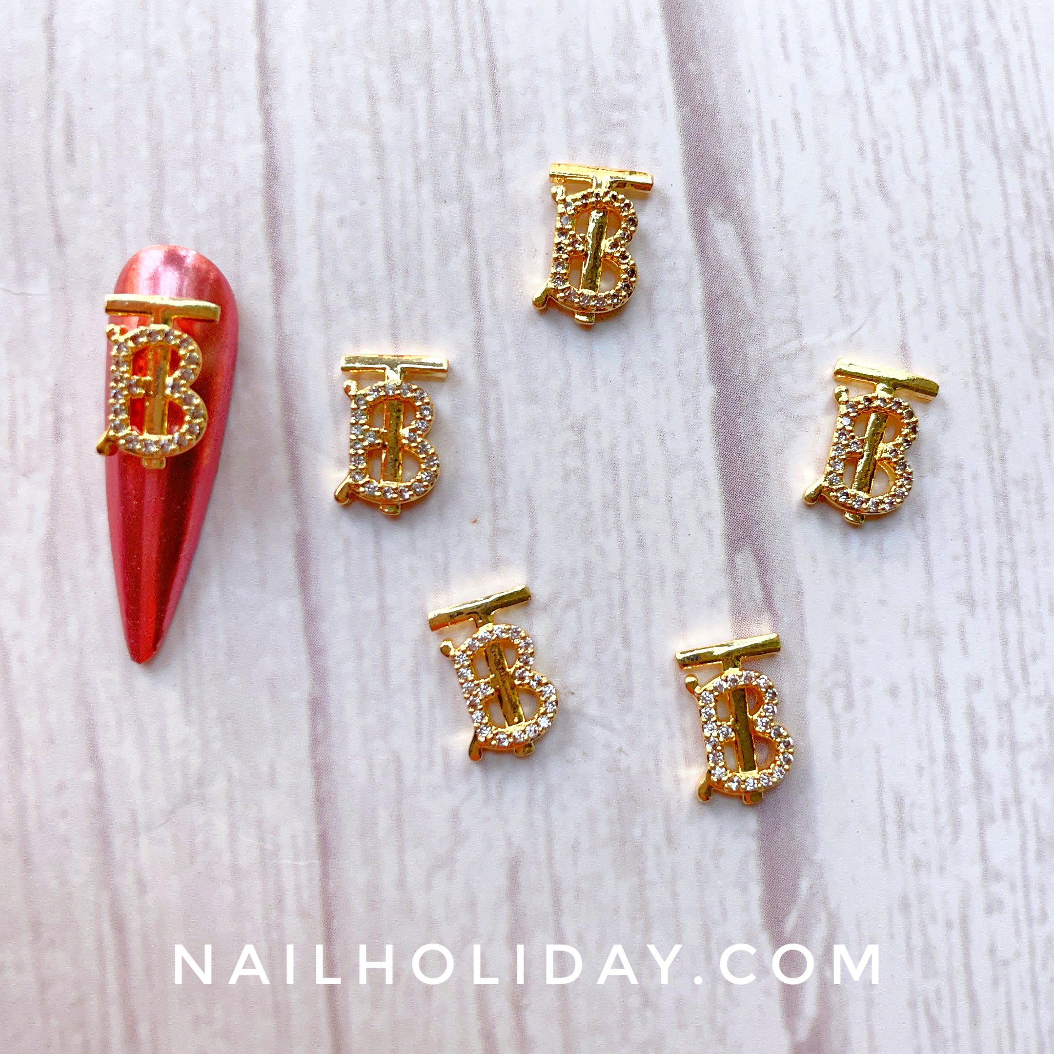 Burberry nail charms gold