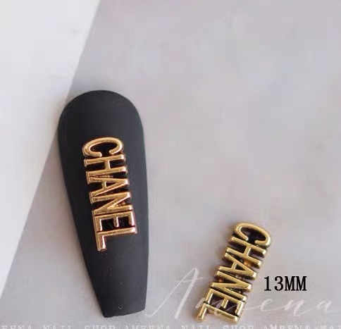 Chanel nail charm gold
