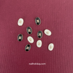 Chanel nail charm